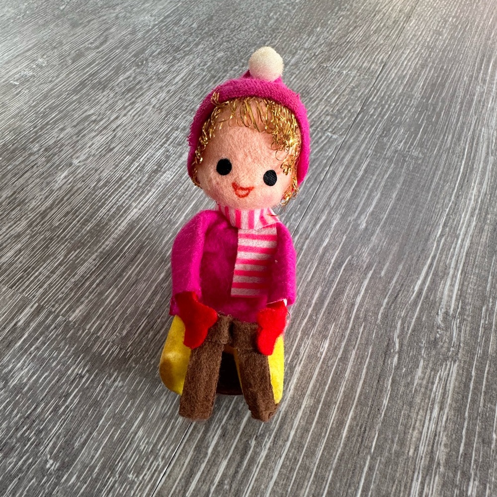 Vintage flocked and felt Christmas ornaments
Cute little elf / sledder